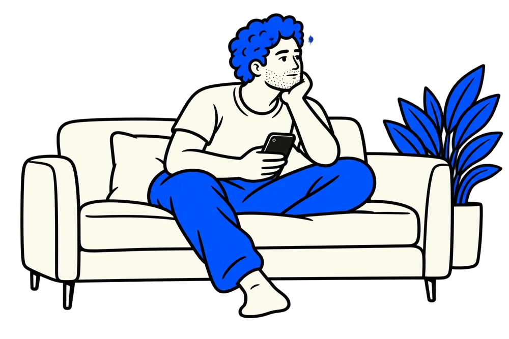 Our illustrated character sitting on the couch with his phone